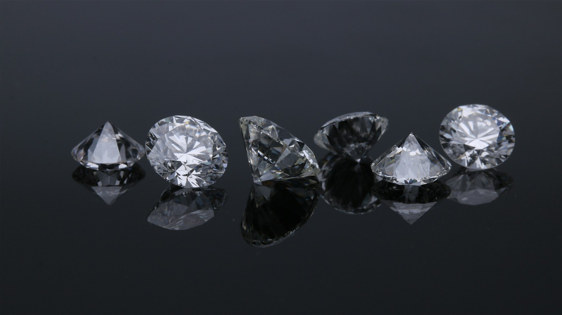 Gemologist examining diamond